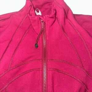 Lululemon define jacket Luon Size 6 in the color
POMEGRANATE.
